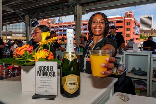A drink being served in the Pit Lane Suite