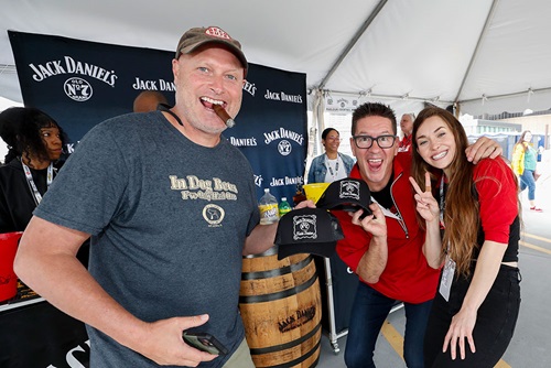 Jack Daniels display with fans celebrating